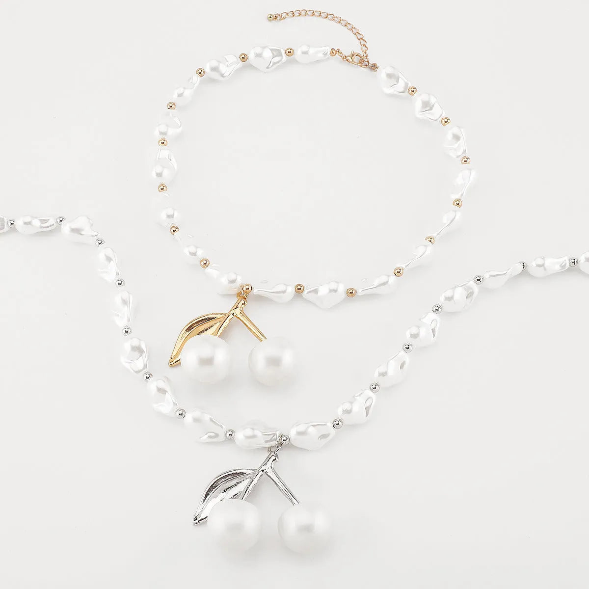 Women's irregular geometric pearl cherry fruit necklace with gold electroplated alloy pendant on adjustable chain