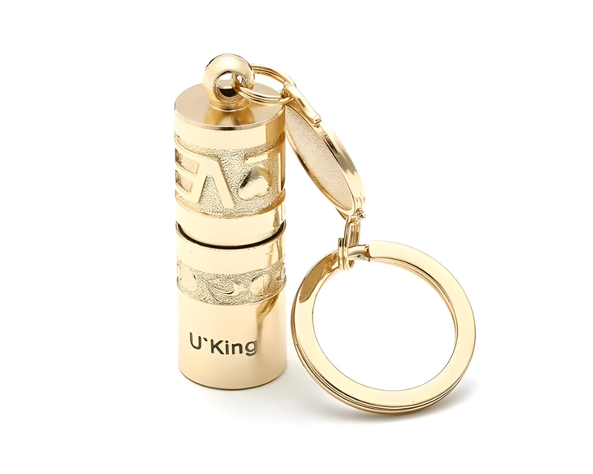 Gold-coloured zinc alloy mini LED keychain flashlight with a keyring.