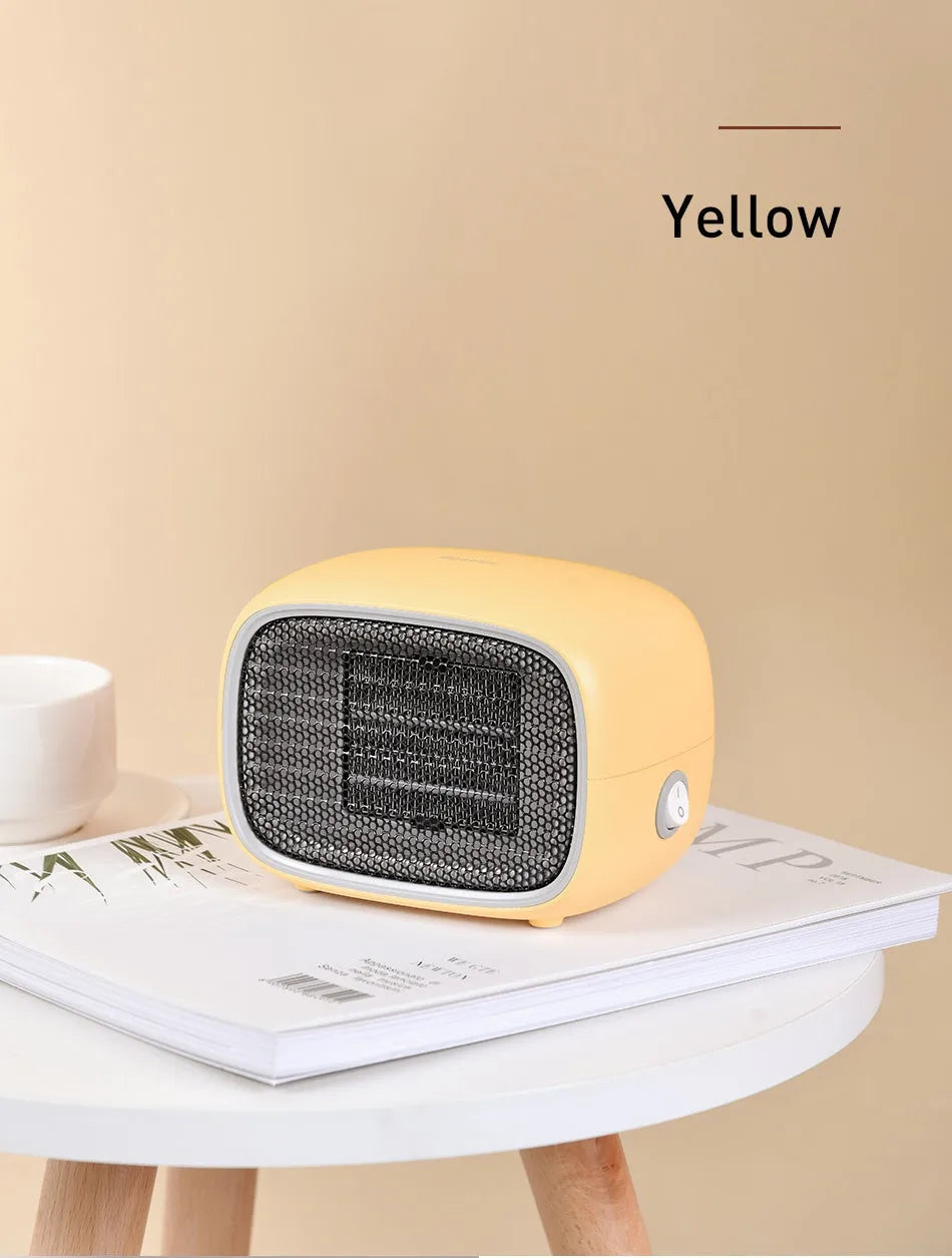 Mini portable electric heater in green colour with compact rectangular design for desk or bedside use