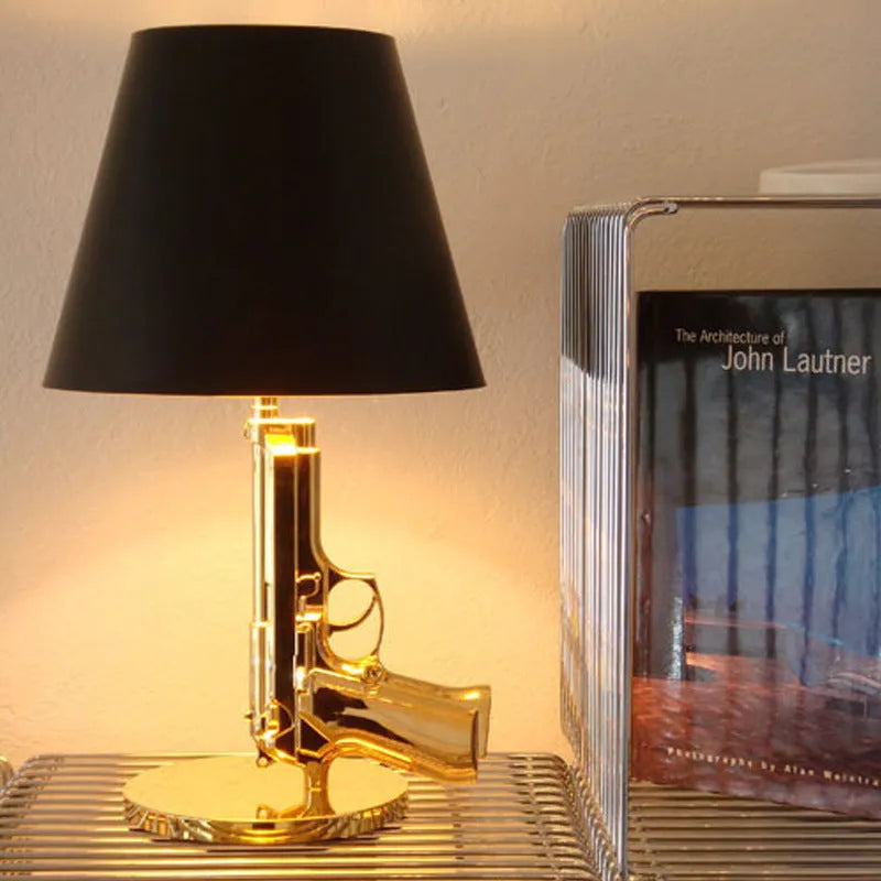 Modern Nordic desk lamp with resin base and plated gold or silver pistol or M16 design, 235x425mm, 220V US plug