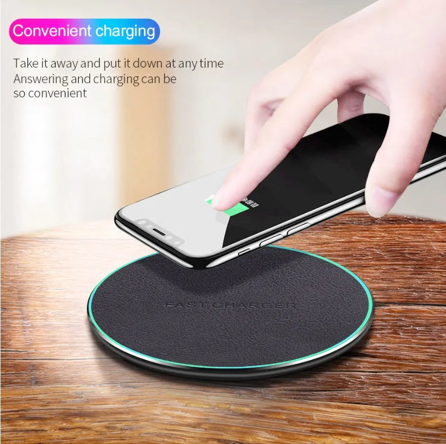Black Qi wireless charging pad for iPhone 11 with non-slip surface and LED indicator