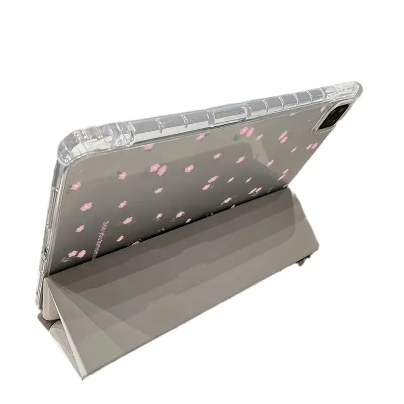 Transparent floral tri-fold iPad protective case showing magnetic stand function.