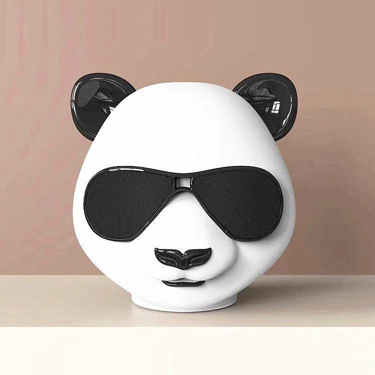 Portable mini Bluetooth speaker with classic styling showing USB port and wireless connectivity