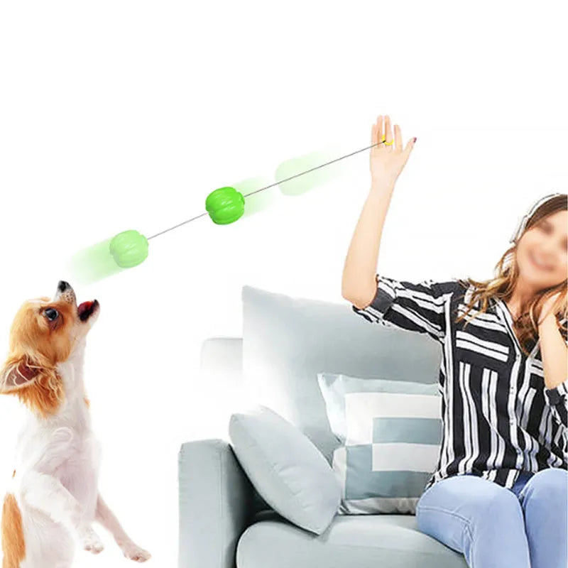 Green, orange, and yellow plastic squeaky pumpkin dog ball toy for small dogs, 68mm diameter.