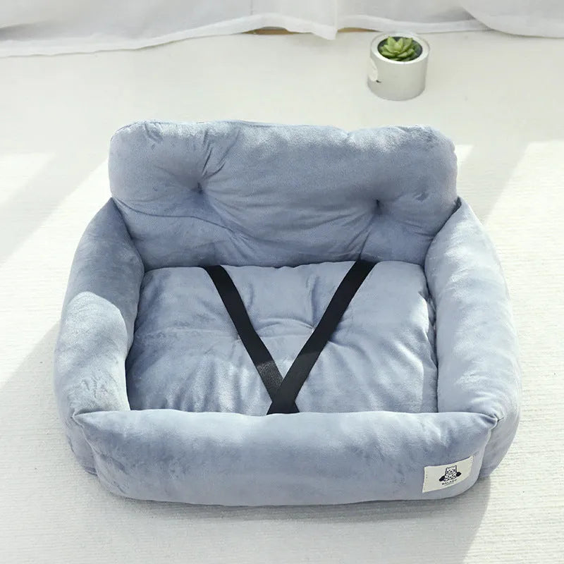 Grey and blue plaid stain-resistant dog carrier for car travel with foldable sides.