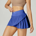 Women's solid colour quick-dry sports shorts in nylon spandex fabric for fitness.