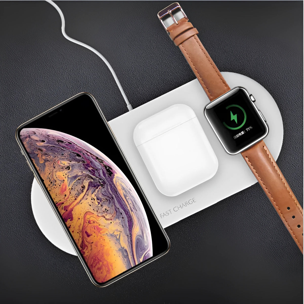 Three-in-one wireless charging station for mobile phone, Apple Watch, and headphones on desktop