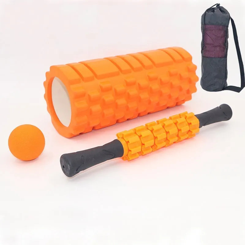Black foam massage roller stick with six gear segments, 33cm long.