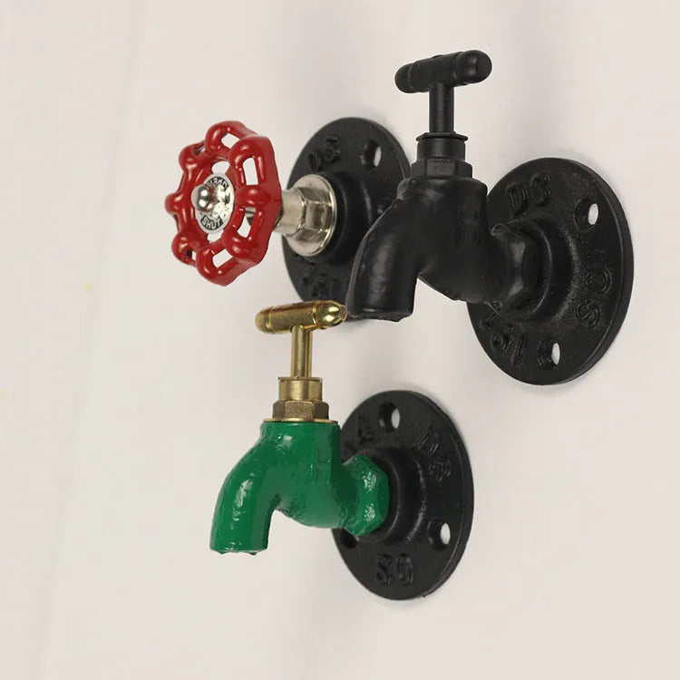 Metal wall hook with water pipe style frame in a choice of three colours.