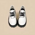 Women's Duke Asterism loafers with a metal cross strap and round toe in preppy college style.
