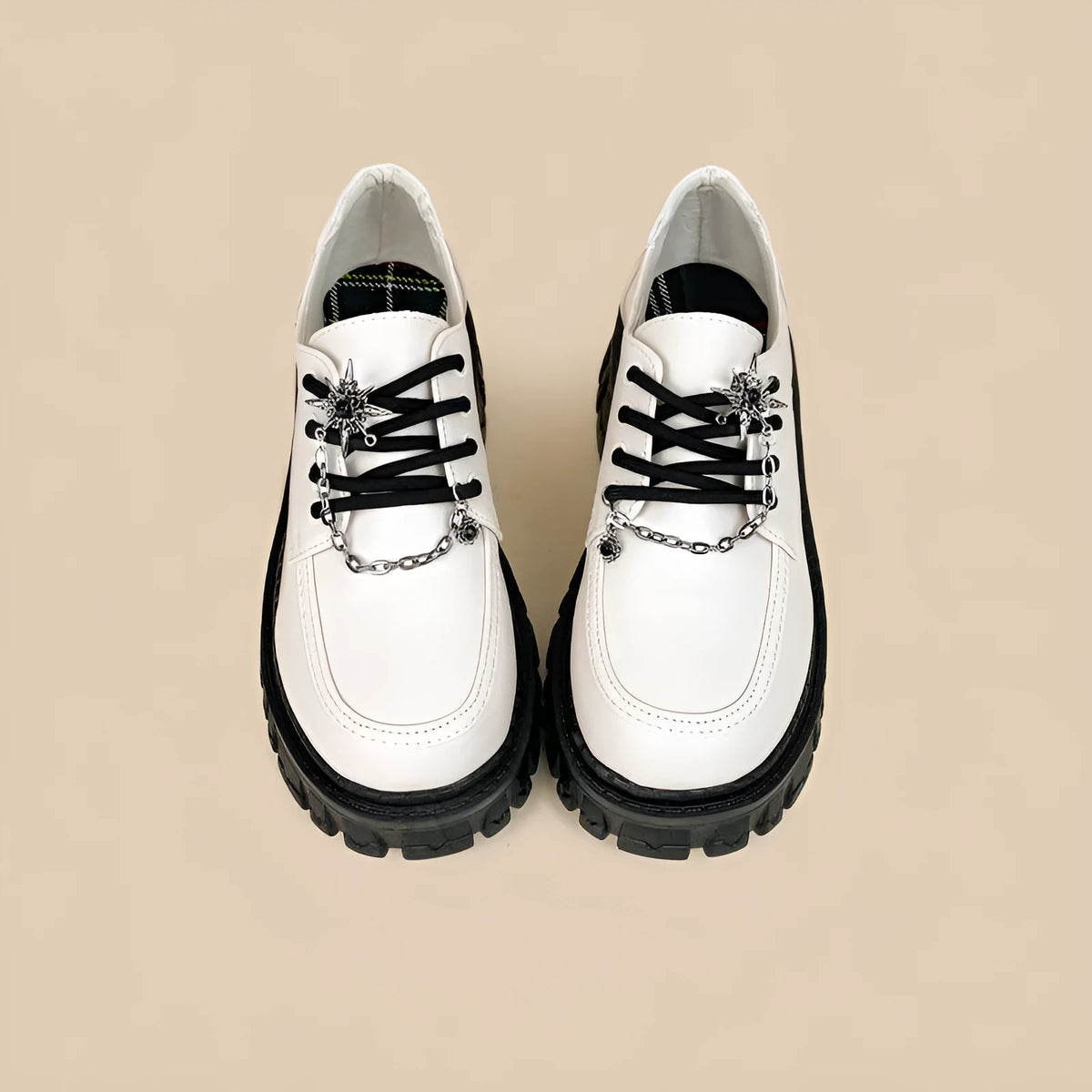 Women's Duke Asterism loafers with a metal cross strap and round toe in preppy college style.