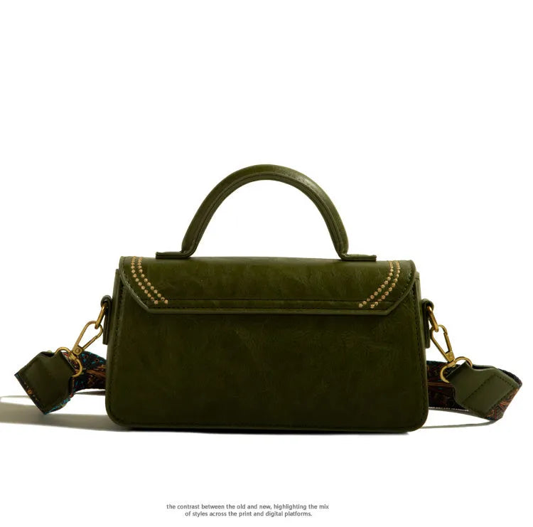 Brown retro messenger bag with vertical square shape showing internal phone and document compartments