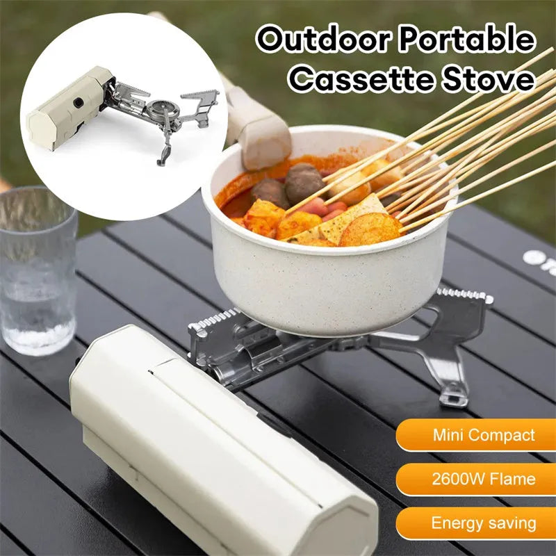 Green folding camping gas stove with serrated cooking bracket and adjustable control valve