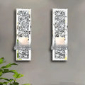 Pair of silver mirror glass candle holders with 10x11x38cm dimensions for wall mounting