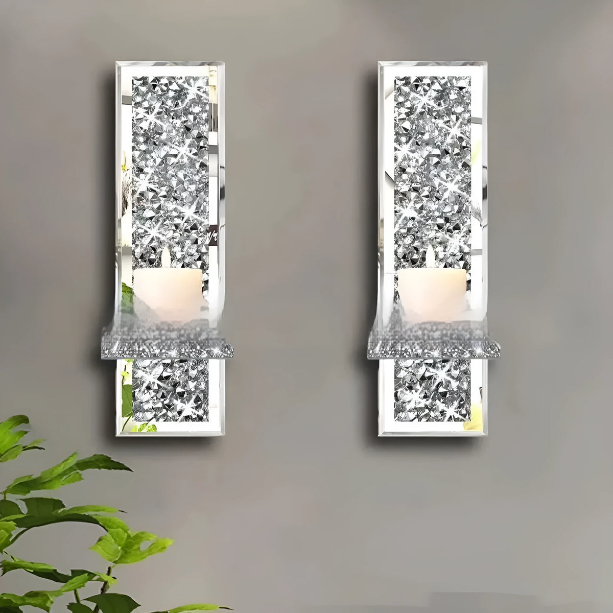 Pair of silver mirror glass candle holders with 10x11x38cm dimensions for wall mounting