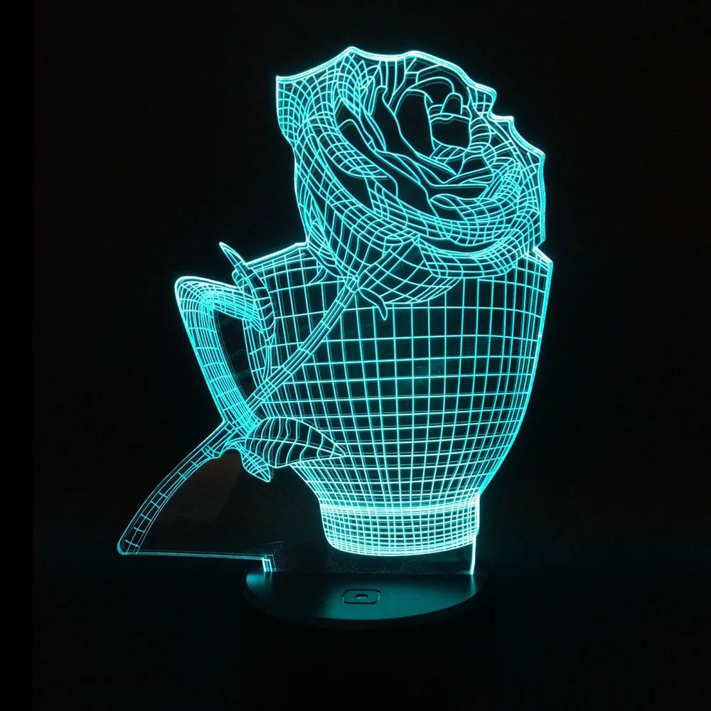 3D rose flower shaped night light with glowing LED colours on a black base, showing remote control.