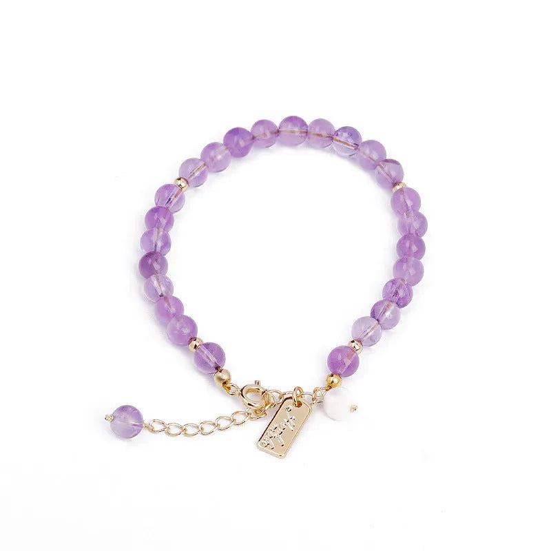 Women's natural crystal amethyst bracelet in romantic lavender colour with zodiac modelling design