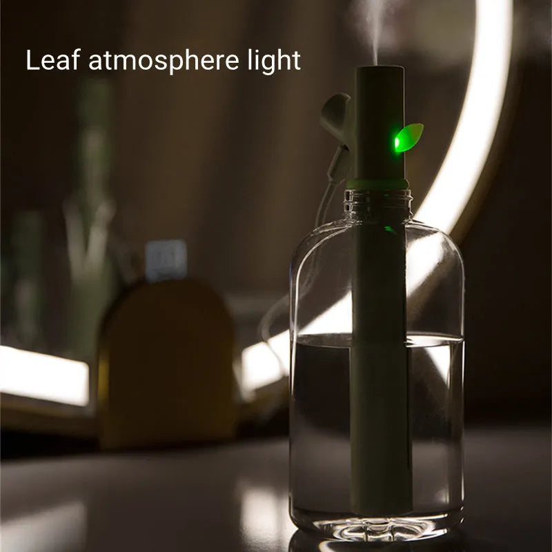 Transparent plastic portable USB humidifier with round design on a desk