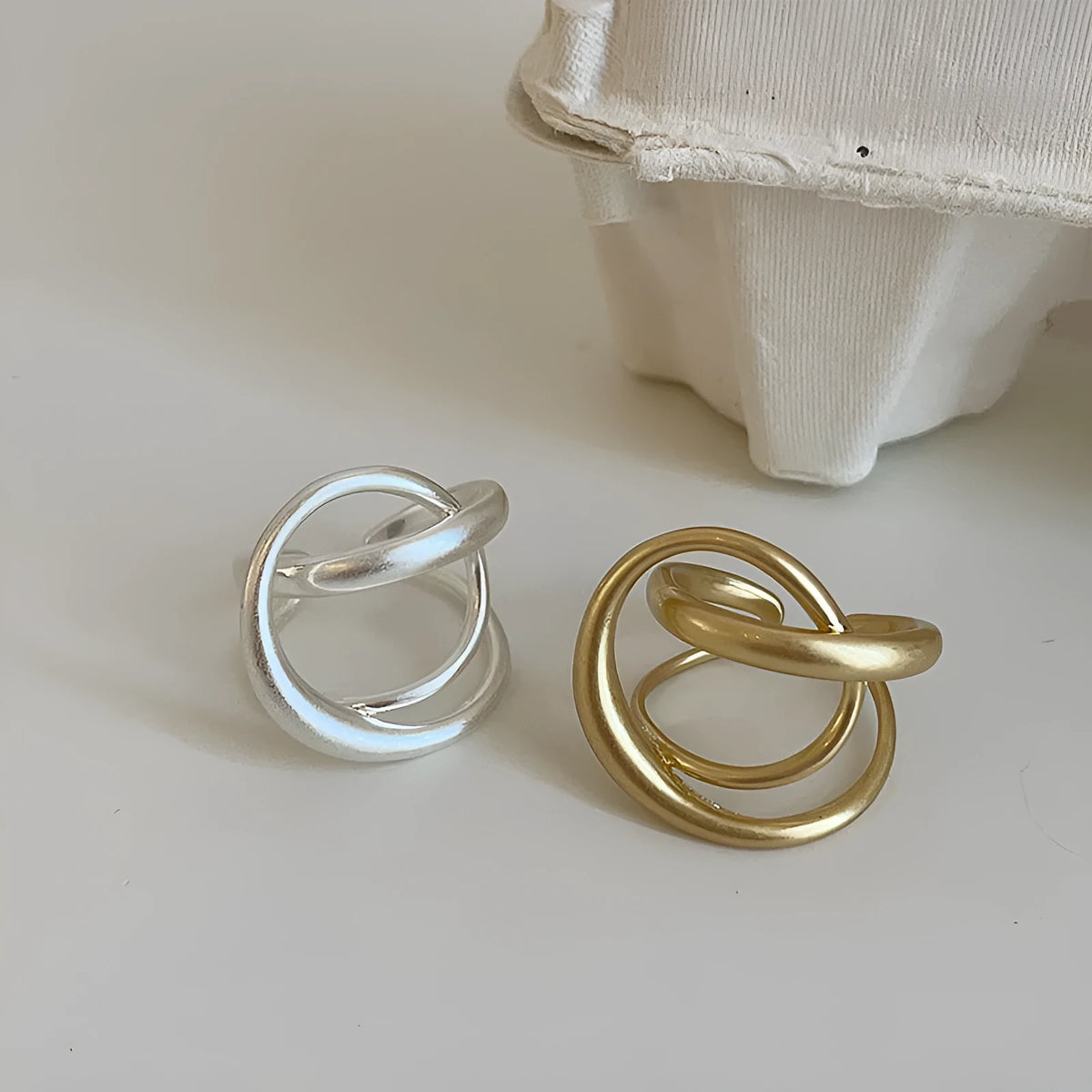 Women's geometric open ring with three-dimensional interlaced matte metal design