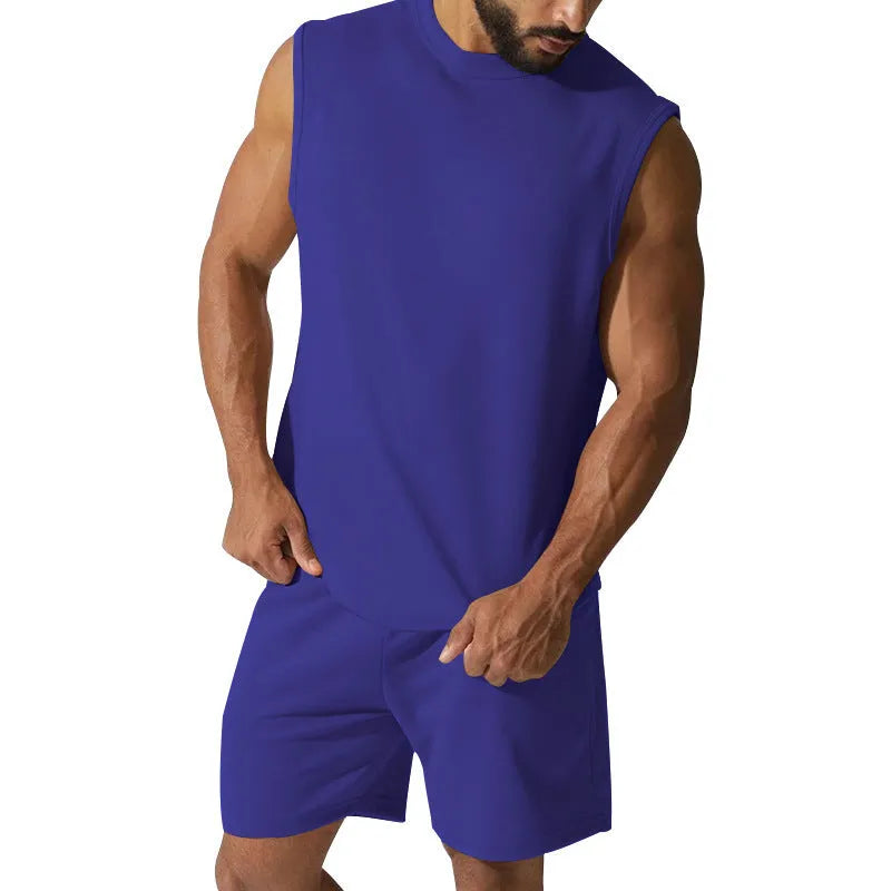 Men's sleeveless cotton blend sports top and matching shorts set in a solid colour.