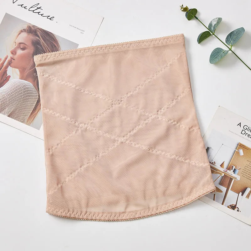 Black mesh postpartum belly band with a cross-waistband design for waist shaping.