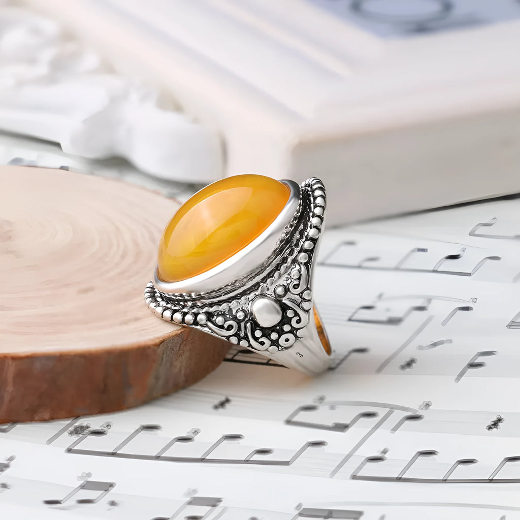 Geometric fluorescent beeswax alloy electroplated ring in antique silver amber colour