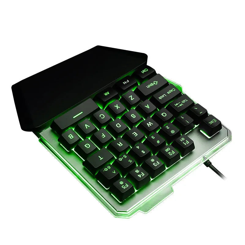Black G40 one-handed mechanical gaming keyboard with RGB backlit keys on a desktop