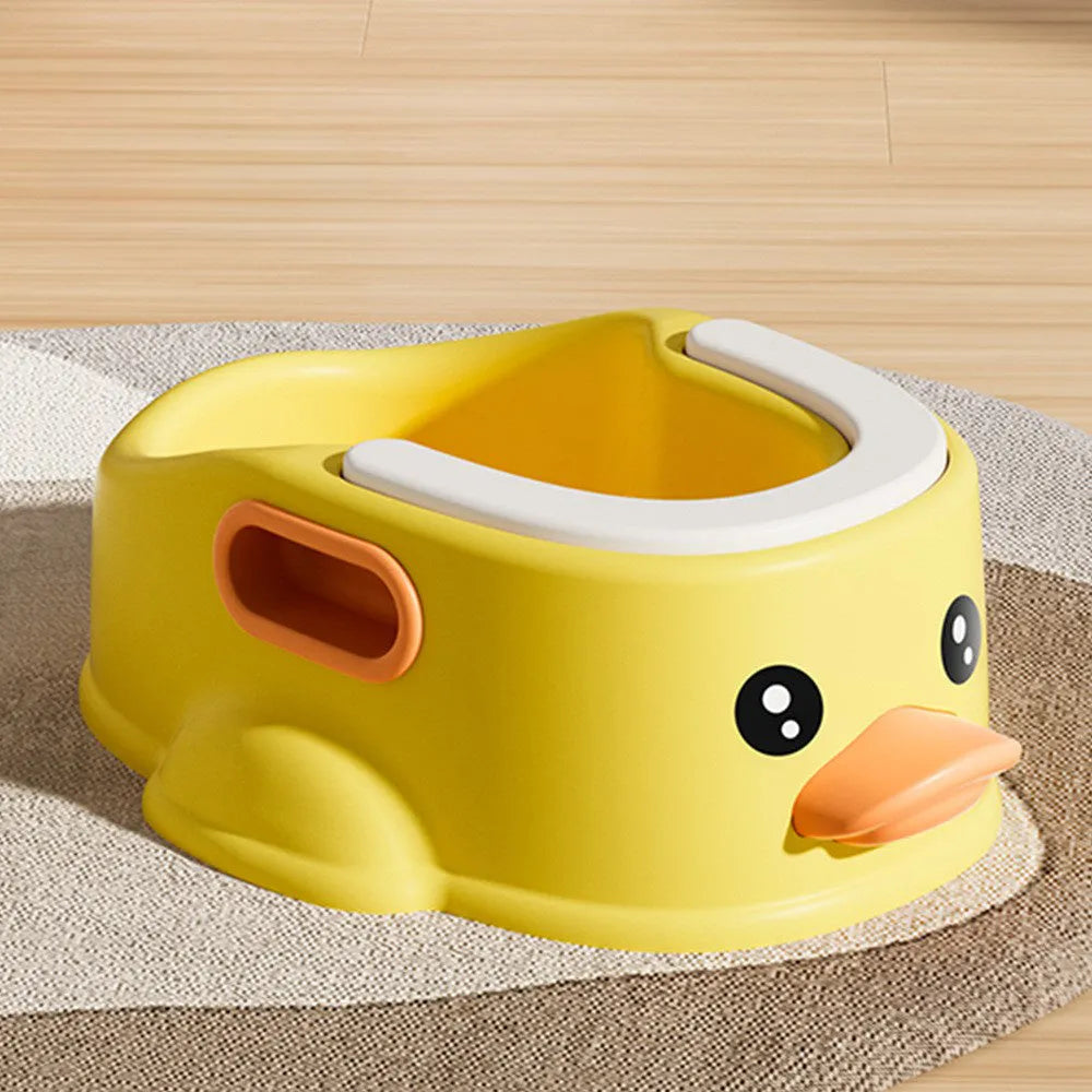 Blue PVC duck-shaped bathtub for washing a small dog, shown on a bathroom floor.
