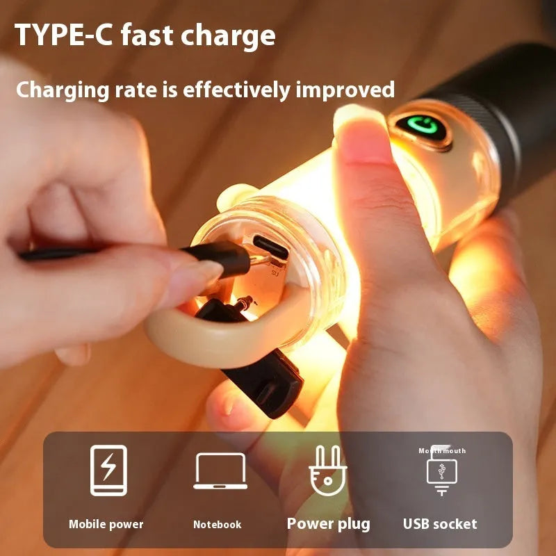 Orange 10W flashlight with hook attachment and optical zoom adjustment