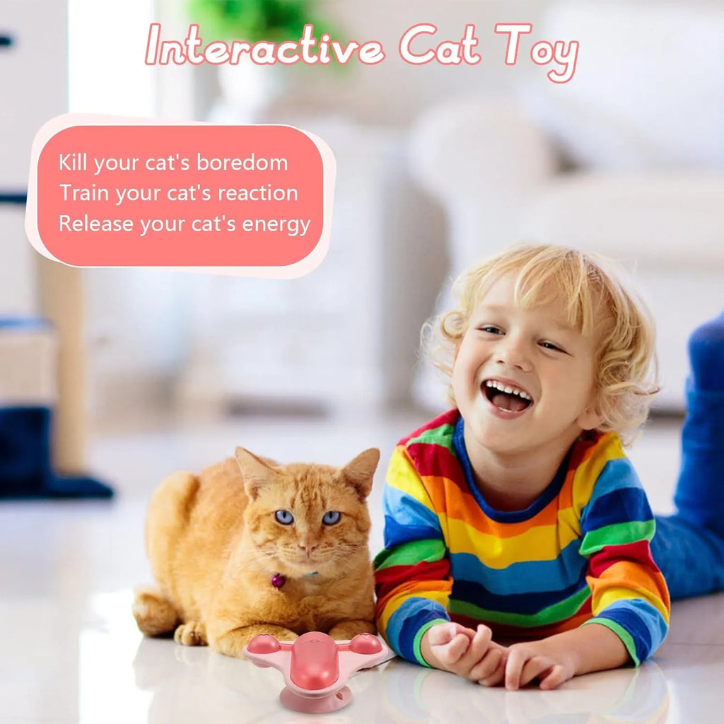 Blue interactive pet puzzle feeder toy with snack cabin, bell, and suction cup base on a floor.