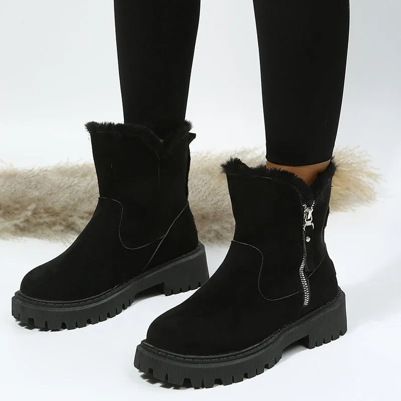 Women's black faux suede high-top snow boots with side zip and non-slip rubber sole.