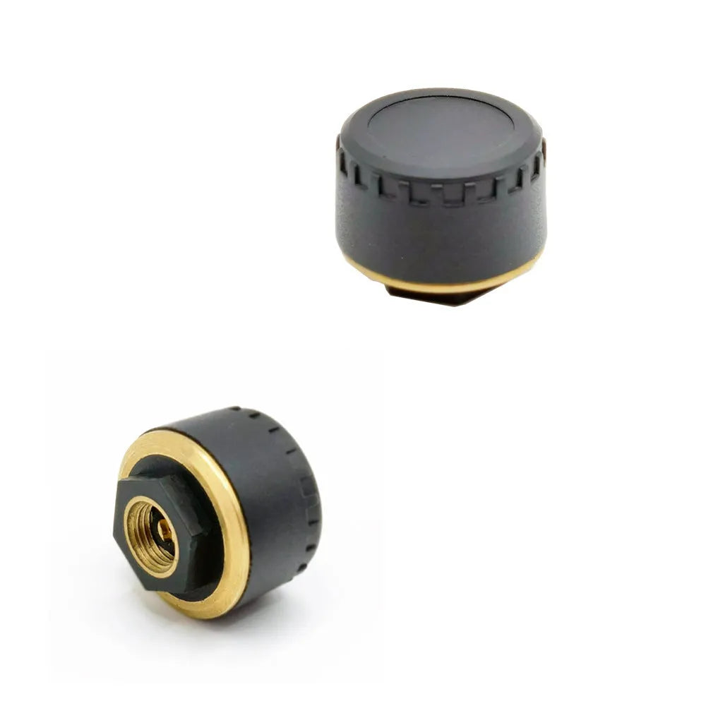 Four black wireless tyre pressure monitors with Bluetooth connectivity for car tyre pressure monitoring via mobile app