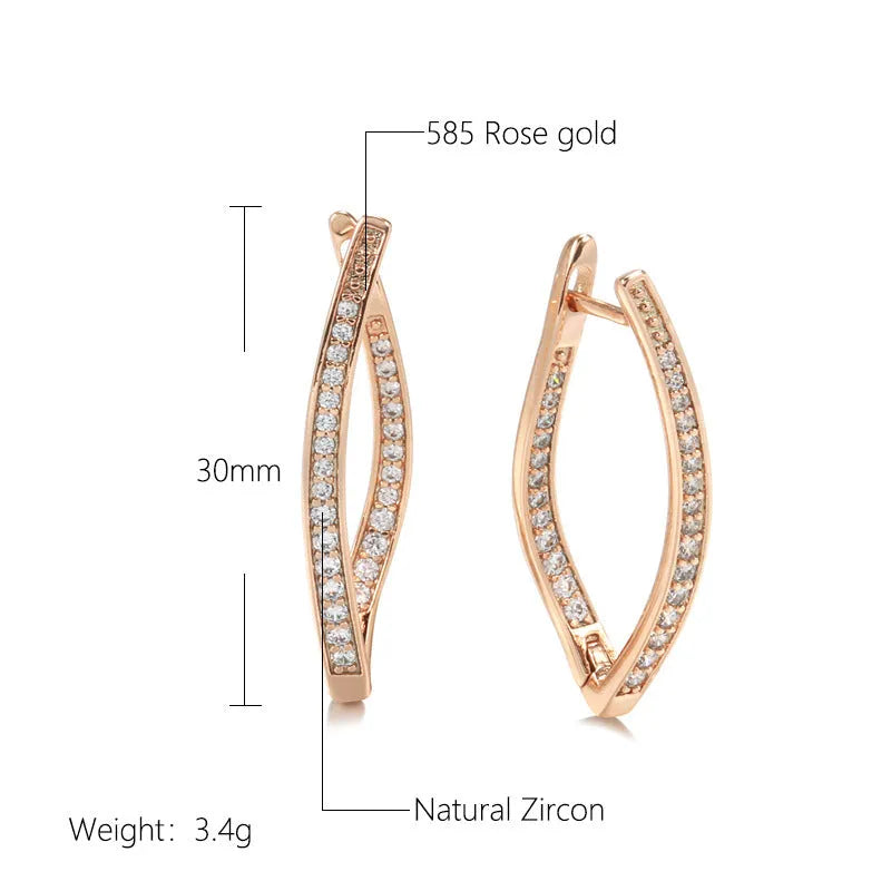 A pair of geometric-shaped copper earrings with zircon detail in H0493 colour, shown from the front.