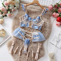Light blue lace women's bra and pants set with mesh panels and embroidery.