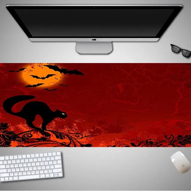 Oversized Halloween gaming mouse pad showing one of 28 available character designs on rubber cloth surface