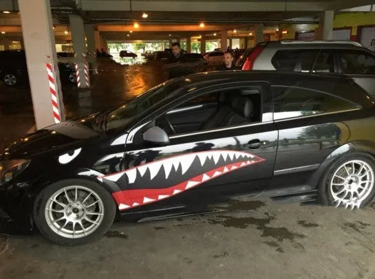 Large shark graphic car sticker on a vehicle door, showcasing the 150cm length PVC decal.