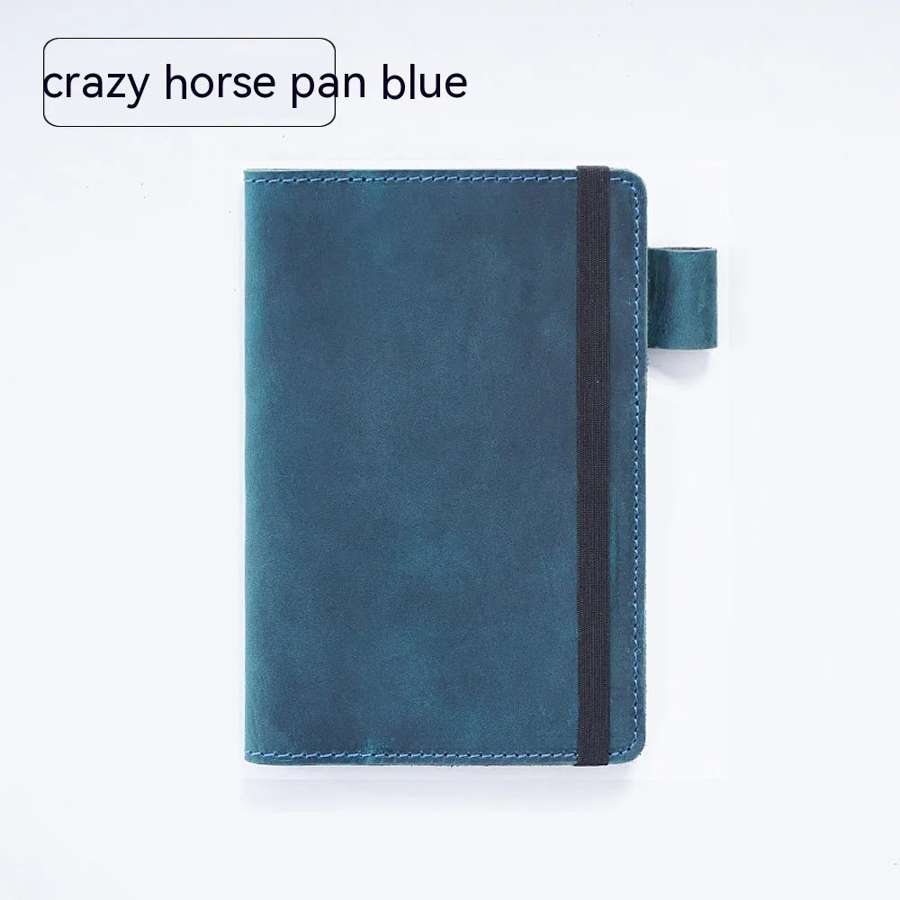Handmade cowhide notebook with wood-free paper in six colour options showing 9x14cm dimensions