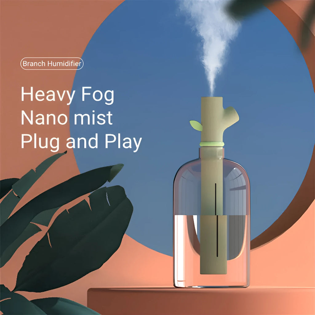 Transparent plastic portable USB humidifier with round design on a desk