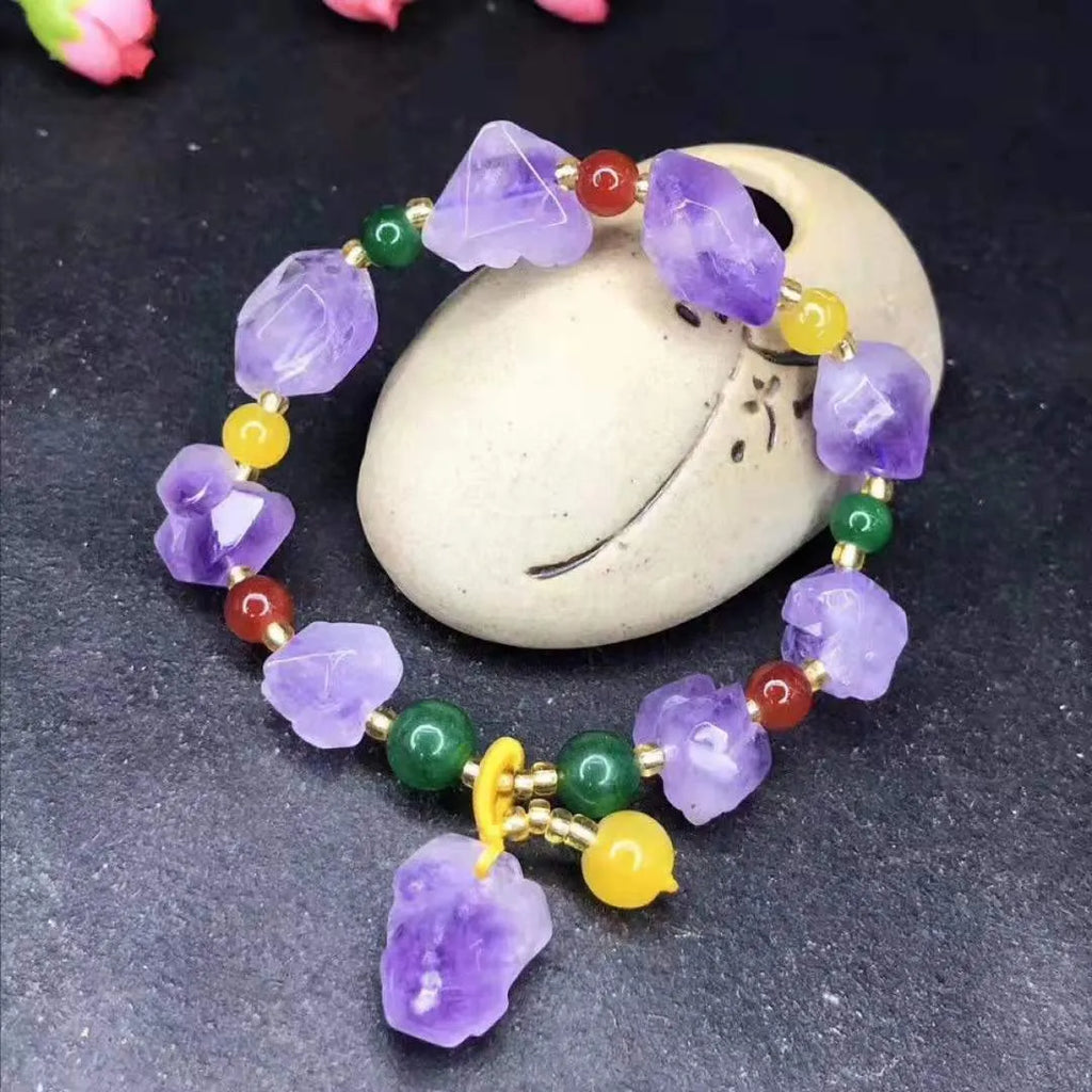 Purple amethyst bracelet with natural-shaped beads and fu character element detail