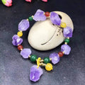 Purple amethyst bracelet with natural-shaped beads and fu character element detail