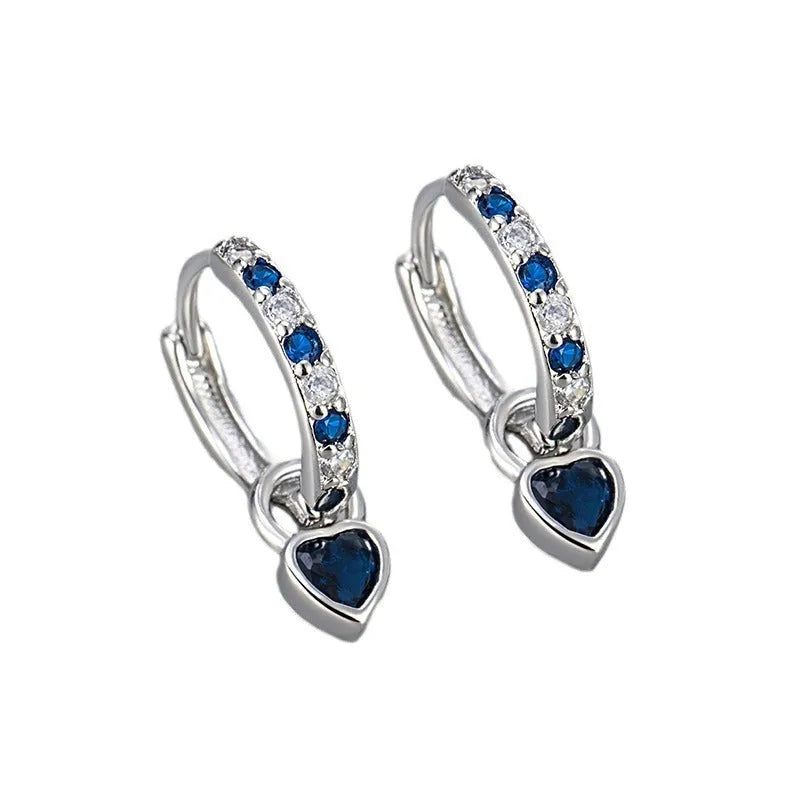 Women's fashion earrings with heart-shaped drops featuring coloured zircon stones in gold or white gold colour plating