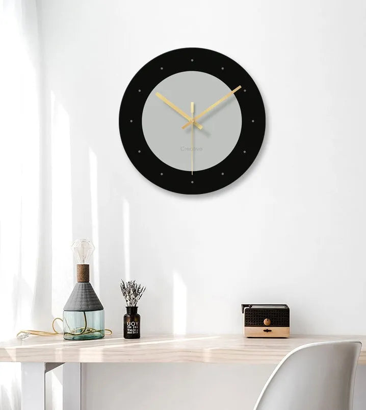 Transparent tempered glass wall clock showing minimalist markings and silent sweep movement
