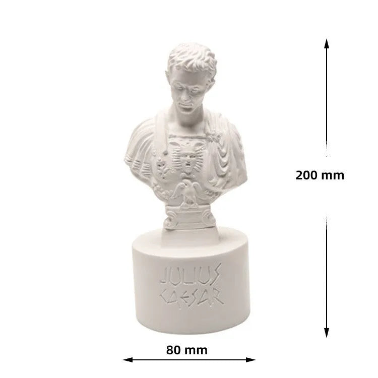 White synthetic resin pen holder with American creative character modelling design on a desk.
