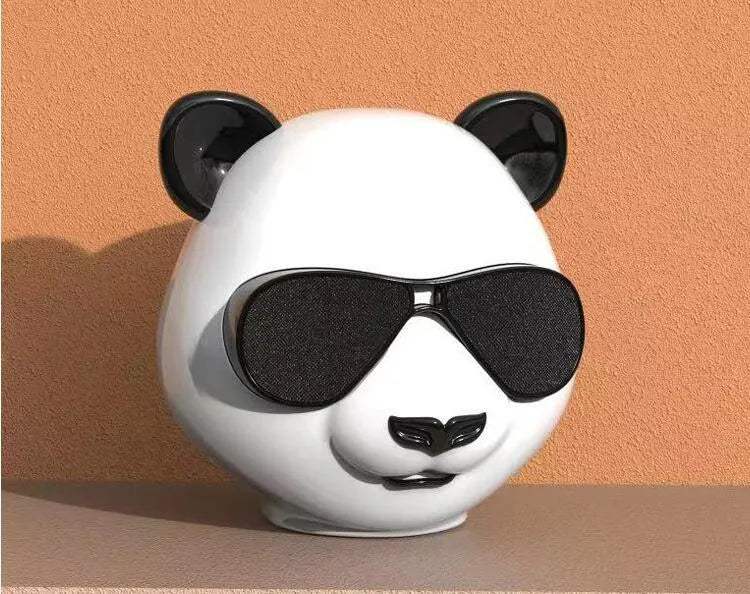 Portable mini Bluetooth speaker with classic styling showing USB port and wireless connectivity