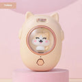 Pink and yellow pet comb with built-in laser pointer for cats and dogs