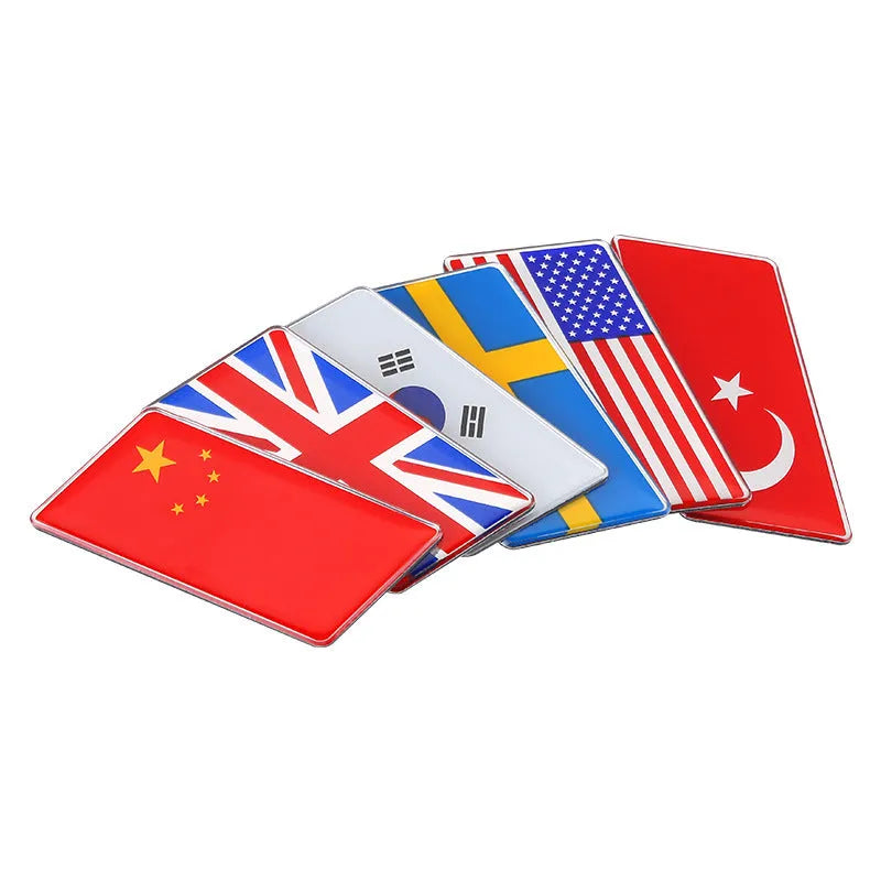 Aluminium national flag car sticker in parallelogram shape on a car surface.