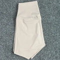 Women's high waist yoga shorts in quick-drying nylon fabric available in multiple colours