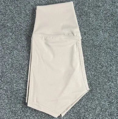 Women's high waist yoga shorts in quick-drying nylon fabric available in multiple colours