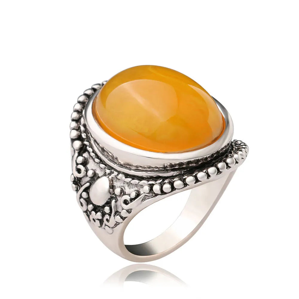 Geometric fluorescent beeswax alloy electroplated ring in antique silver amber colour