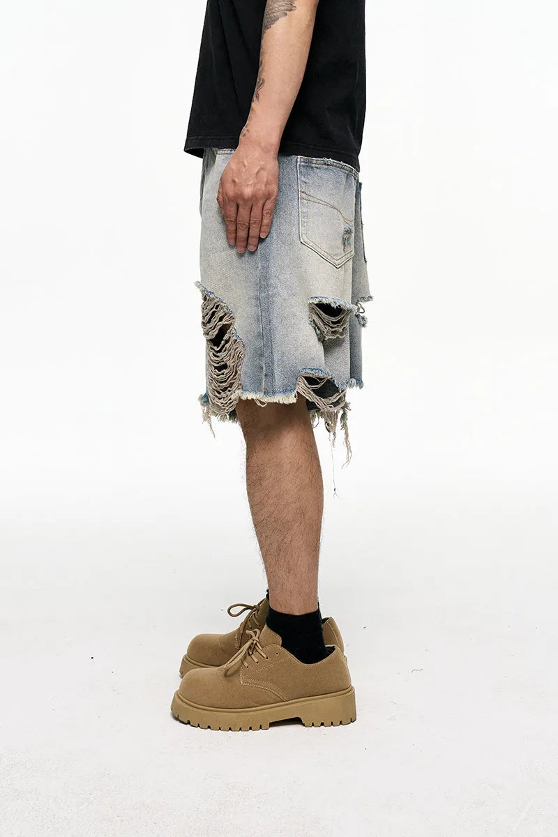 Light blue retro washed men's baggy denim shorts on a mid-waist mannequin.
